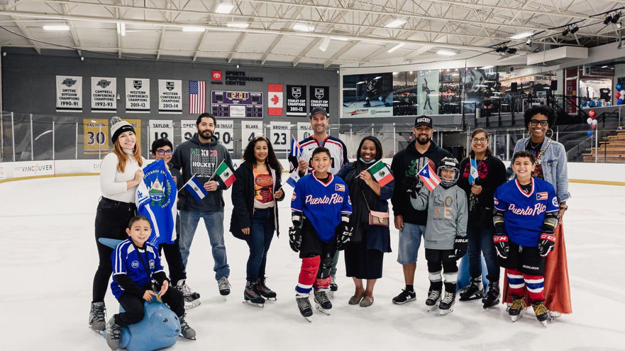 Al Montoya poses with youth from 24 Degrees of Color. Photo credit: Jason C Williams Photography