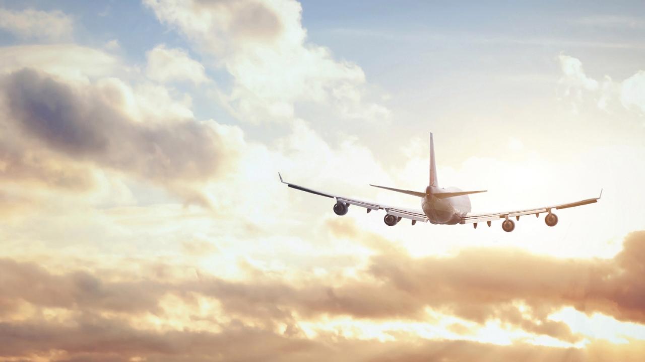 plane flying in the clouds