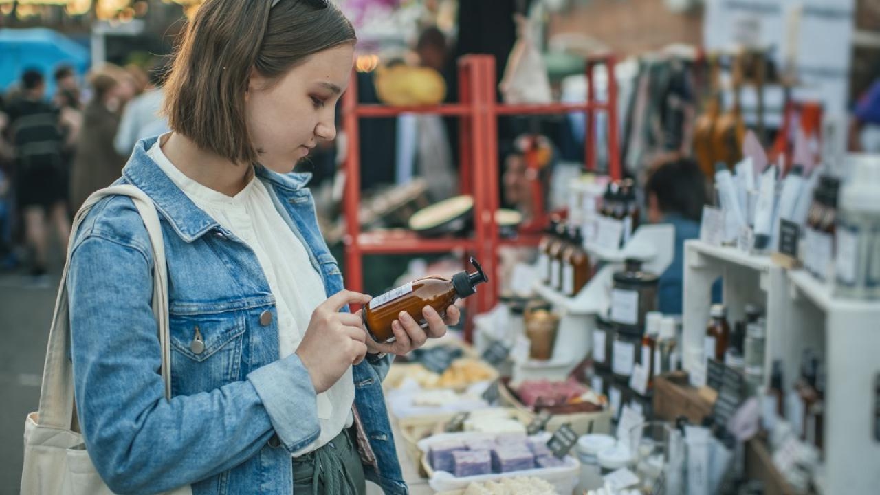 Woman Reading Label on Product