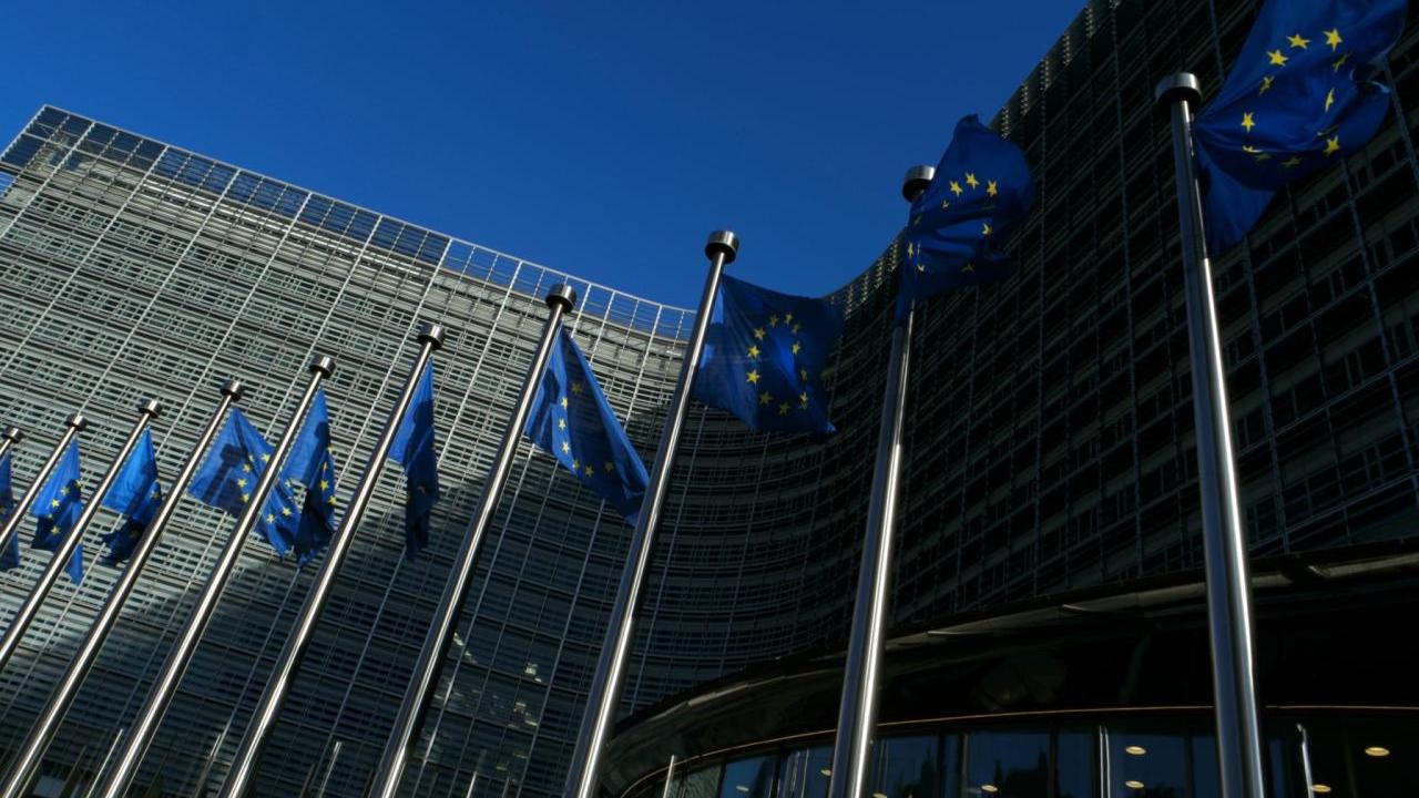 A large building that has EU frags outside 
