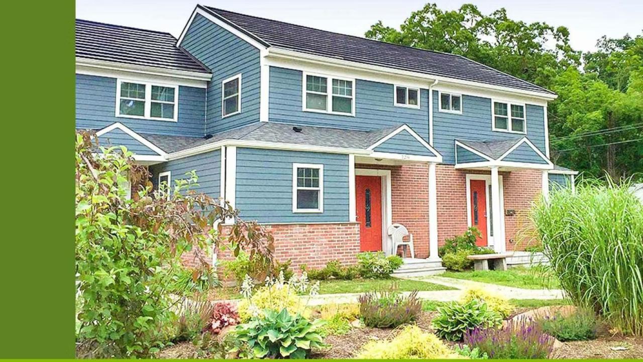 exterior of townhouse with landscaping in front