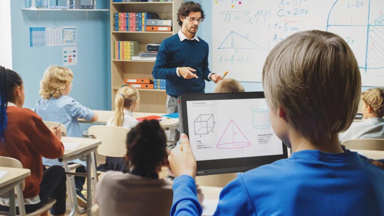 Student using a tablet in a math class