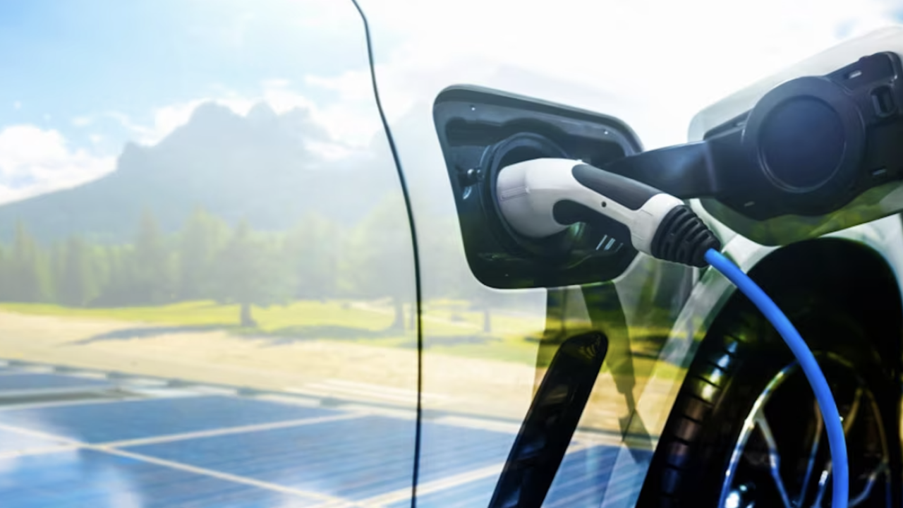 Electric vehicle plugged in charging 
