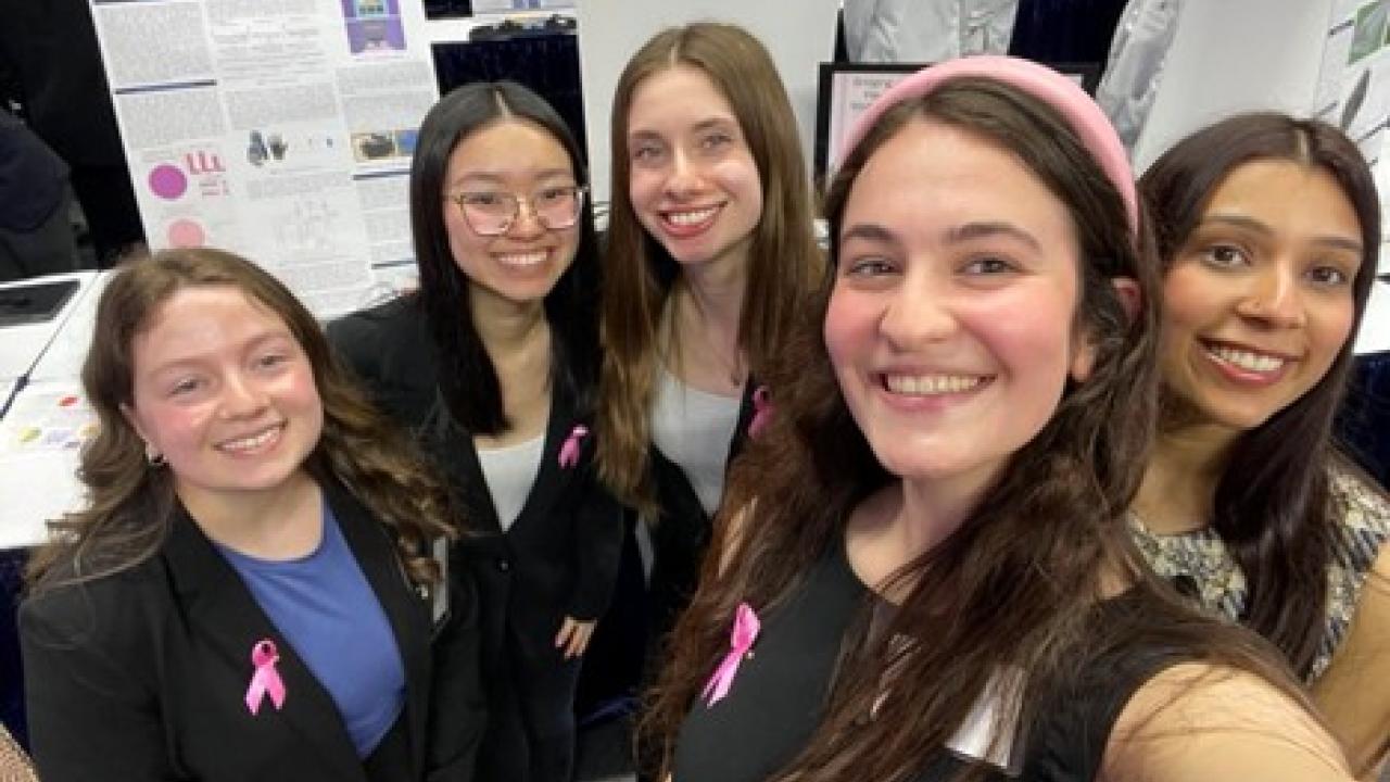 Emily Jacobs, far left, of Medtronic, with the group of young innovators.