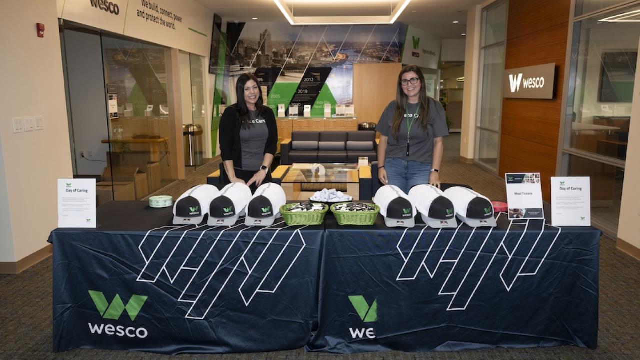 Wesco employees green new hires.