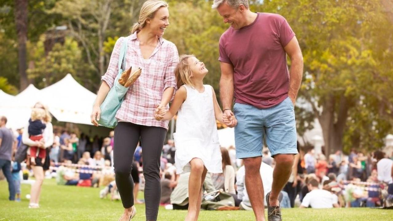 A family enjoying an outside event
