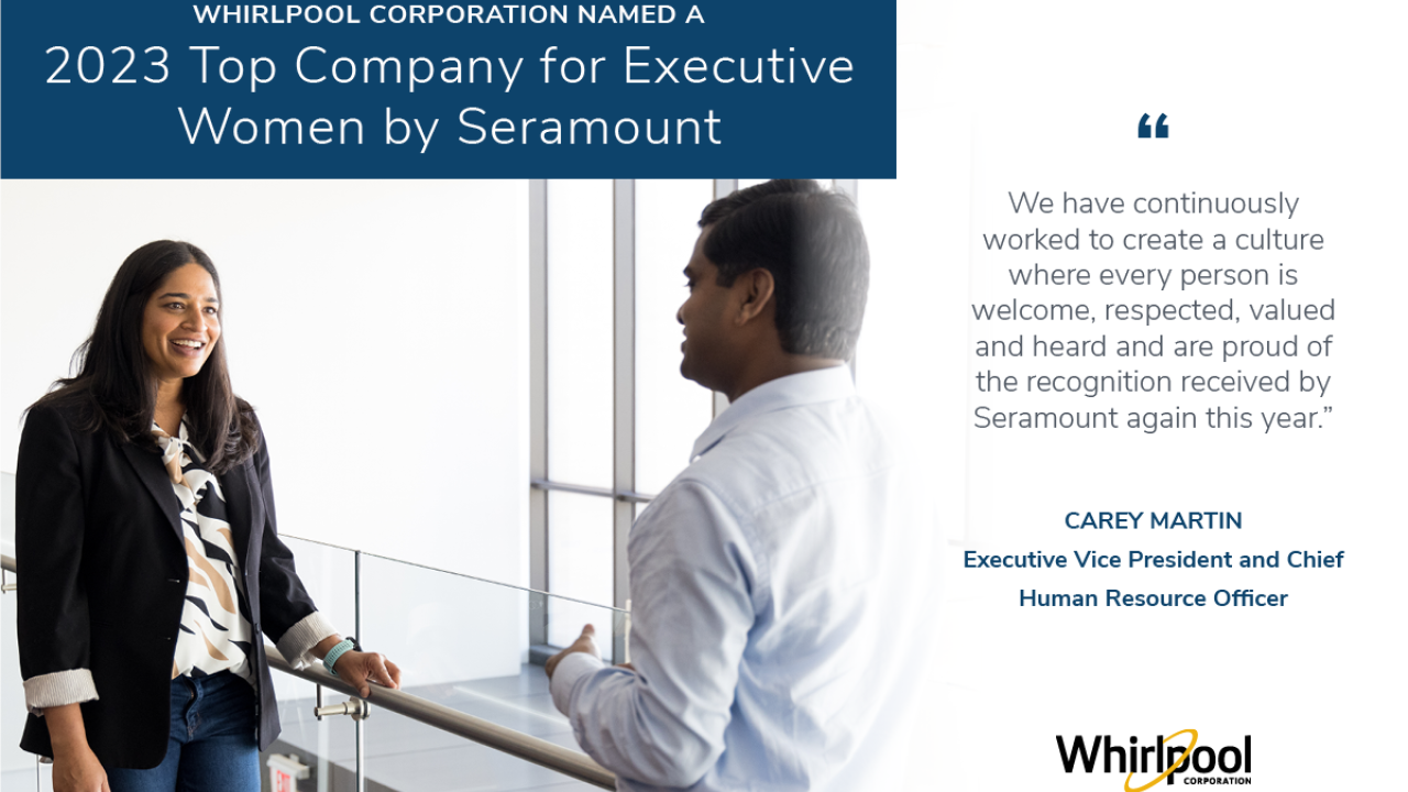 Two people talking in an office building. "Whirlpool corp named a 2023 top company for executive women by seramount and quote "“We have continuously worked to create a culture where every person is welcome, respected, valued and heard and are proud of the recognition received by Seramount again this year.”