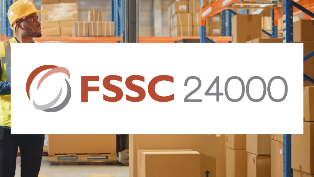 "FSSC 24000" over the image of a person in safety gear looking at shelves of boxes.