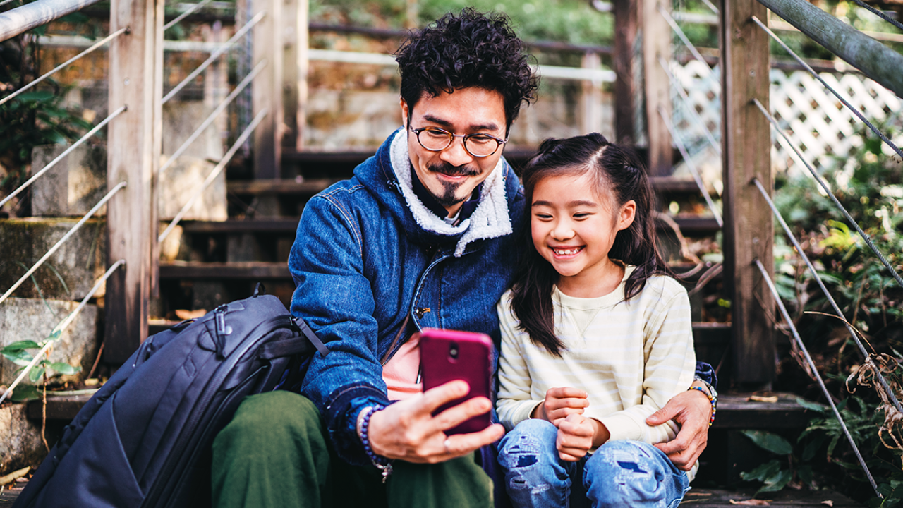 Father and Daughter on Phone