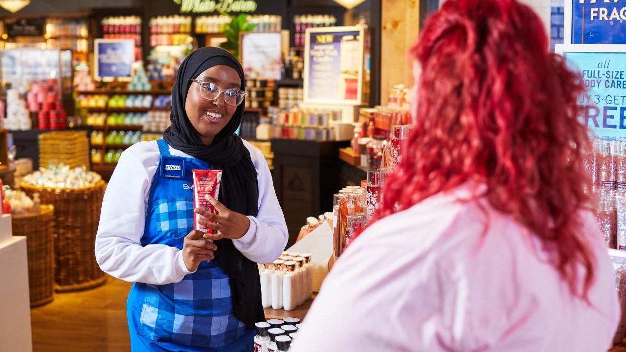 people talking at a Bath and Body Works store