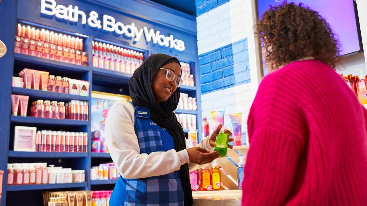 person working at a Bath & Body Works store