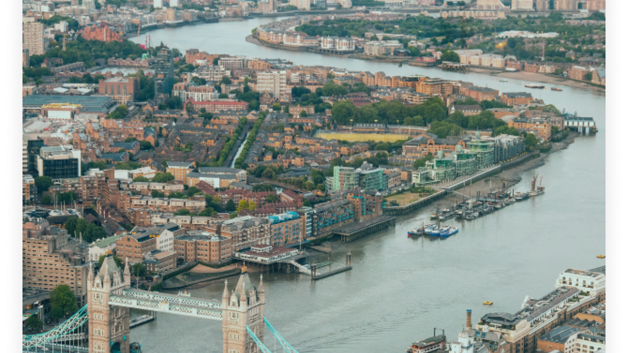 Overhead photo of London, the Thames River and London Bridge.