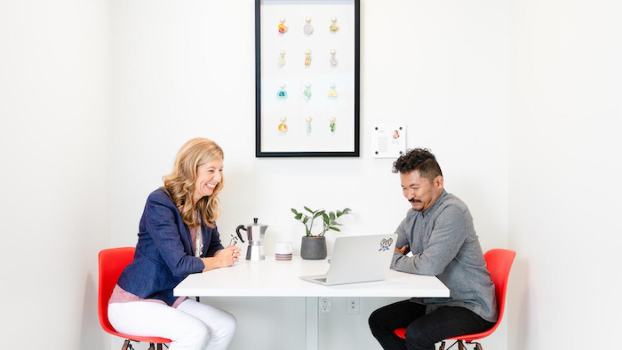 Photo: Kim M. & Srey P. — GoDaddy Employees
