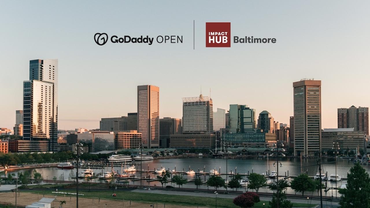 GoDaddy Open: Impact Hub Baltimore. Baltimore skyline shown.