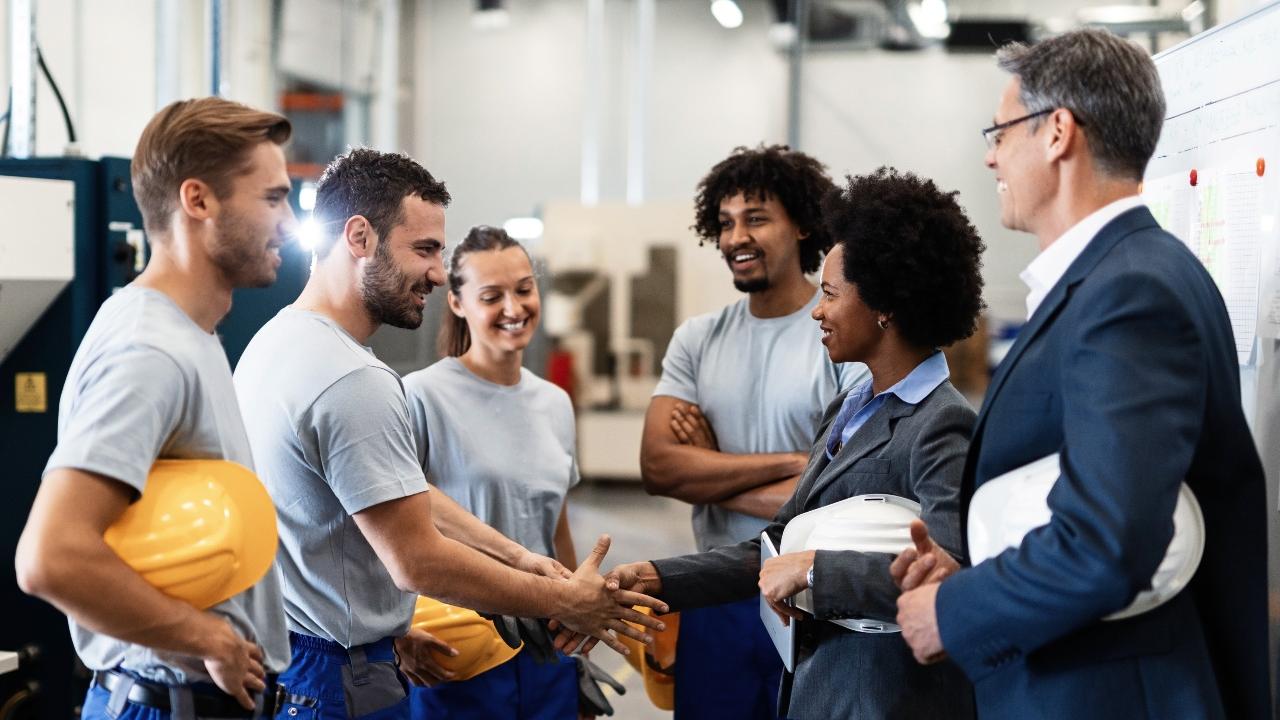 group of people holding rugby balls