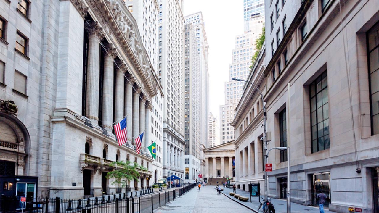picture looking down city street with buildings on either side