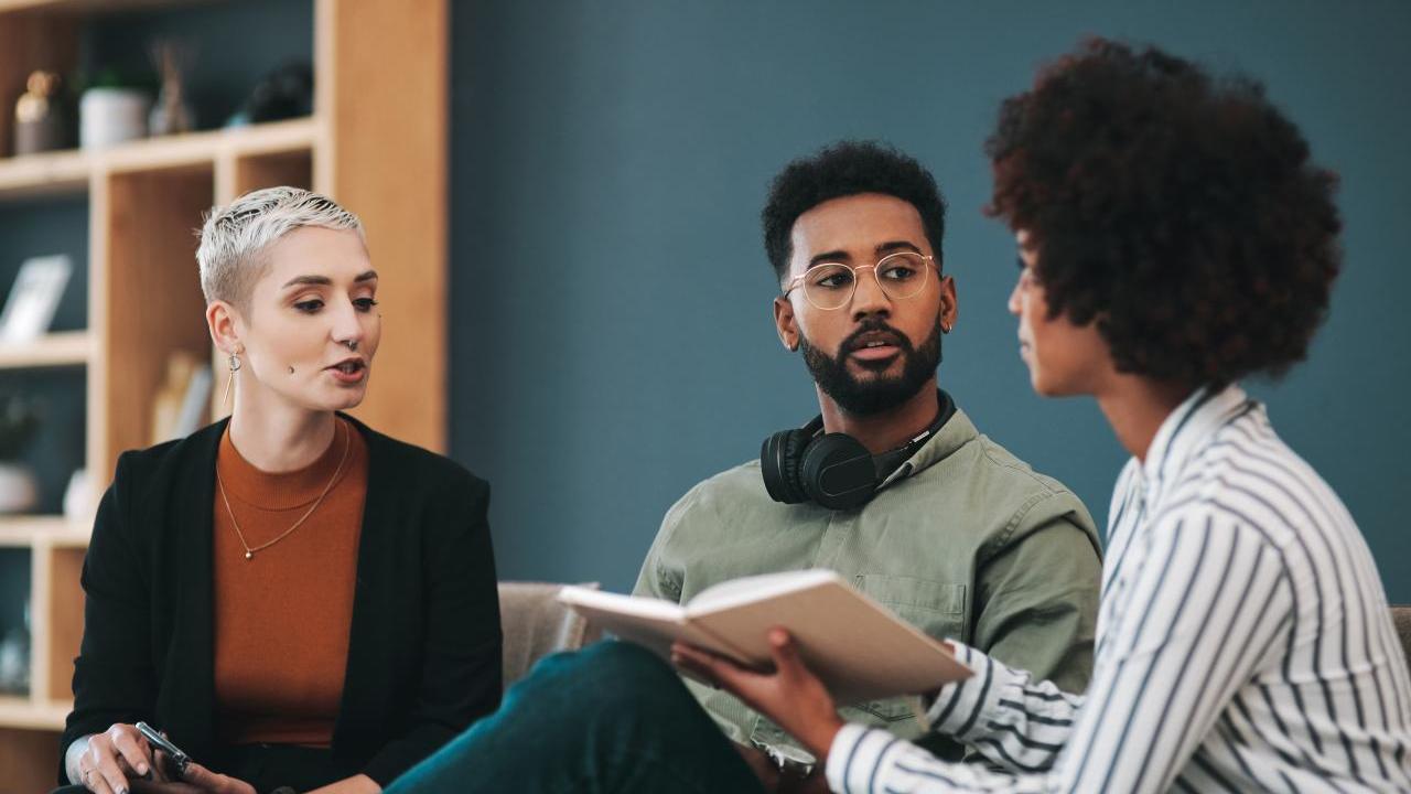 Three people studying together