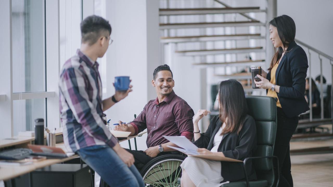 employees talking over coffee