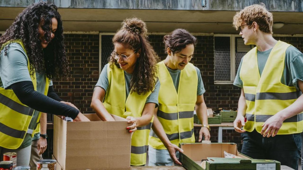 Four people volunteering