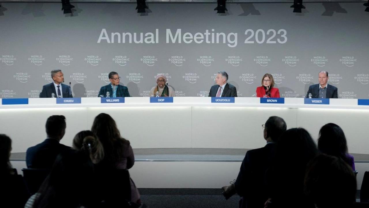 Merck Annual Meeting photo of people at a conference table