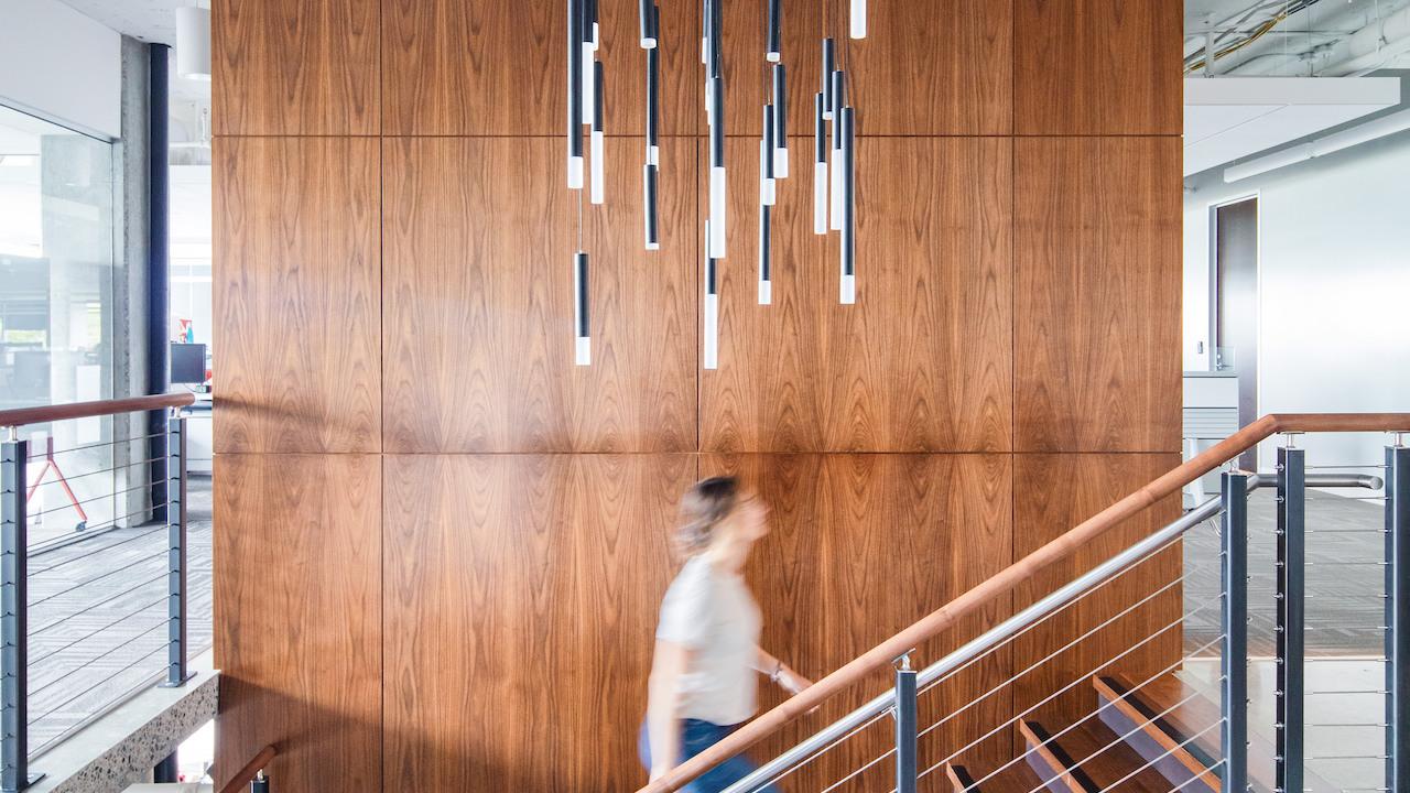 A person walking up a set of stairs.