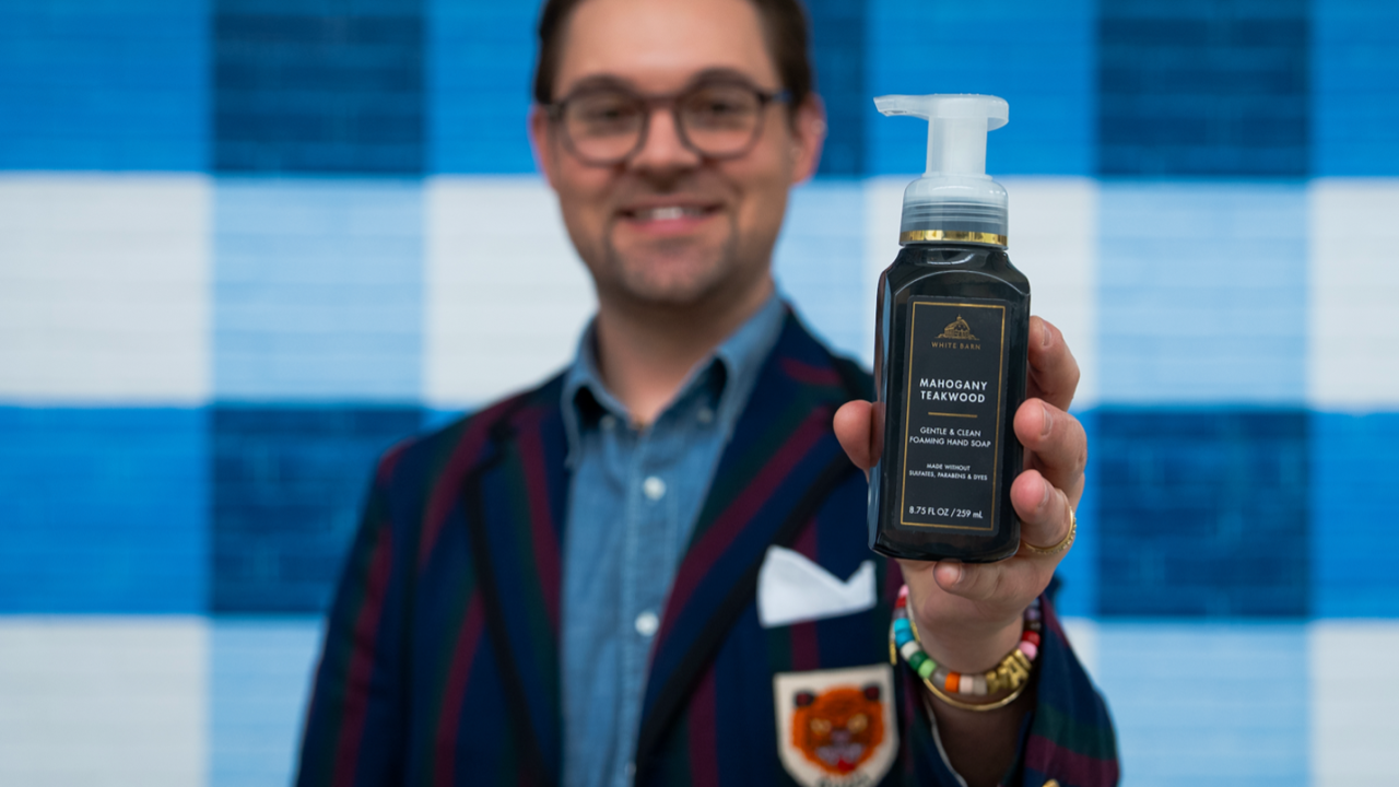  Ian Estep holding Bath&Body Works product
