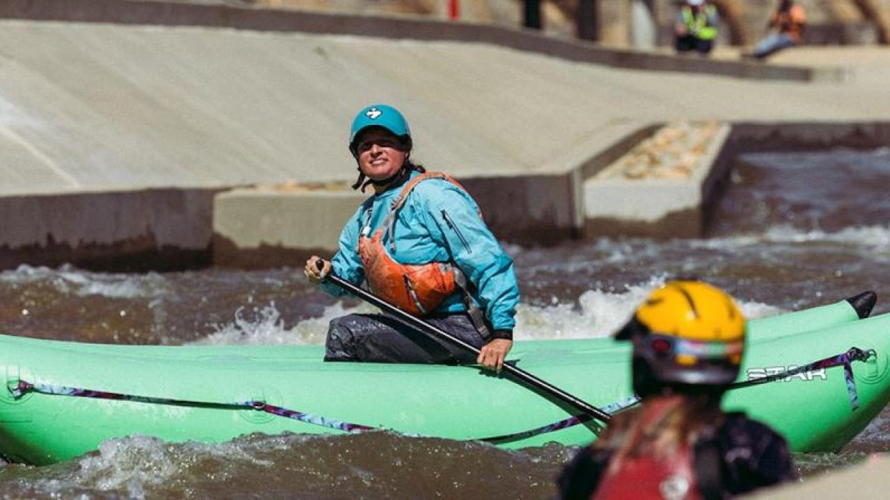 person kayaking in the river 