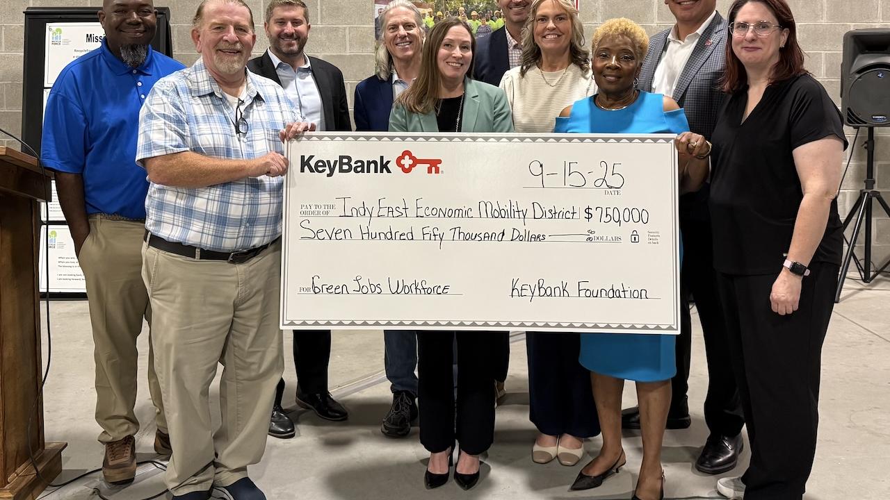 Representatives from KeyBank and IndyEast shown with a $750,000 grant check.