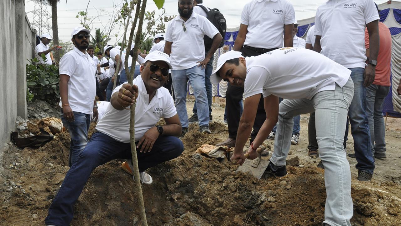 group of people planting