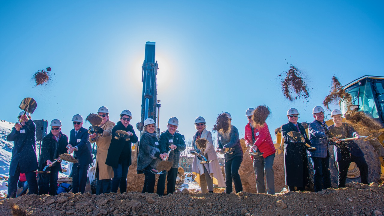 Group of people breaking ground on Junior Achievement (JA) Free Enterprise Center