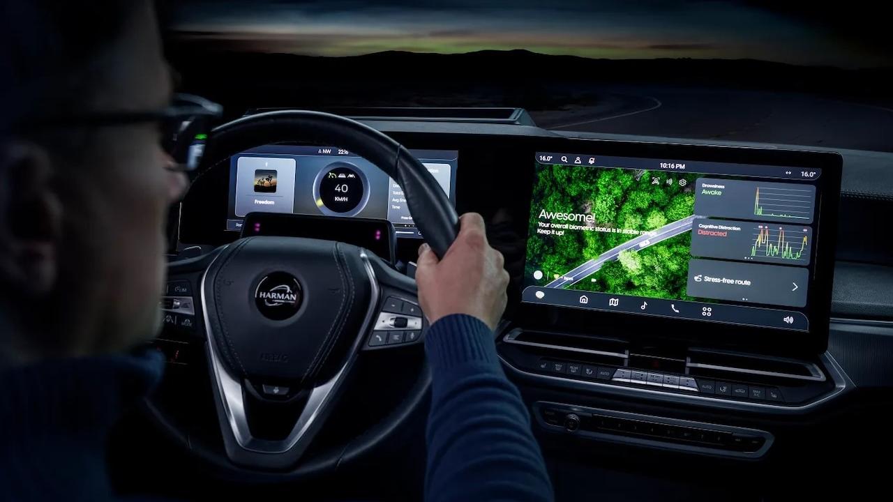 Driver shown viewing a HARMAN TechCrunchheads up display.