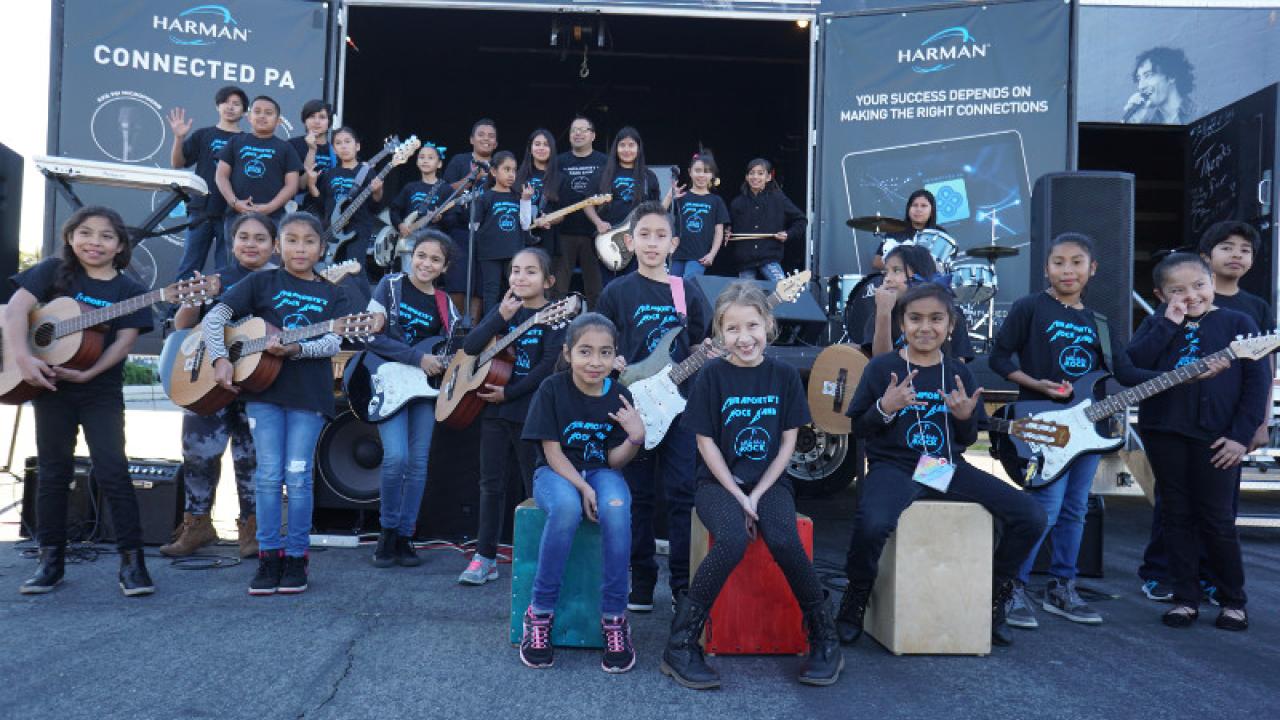 HARMAN Kids Rock; children shown with guitars.