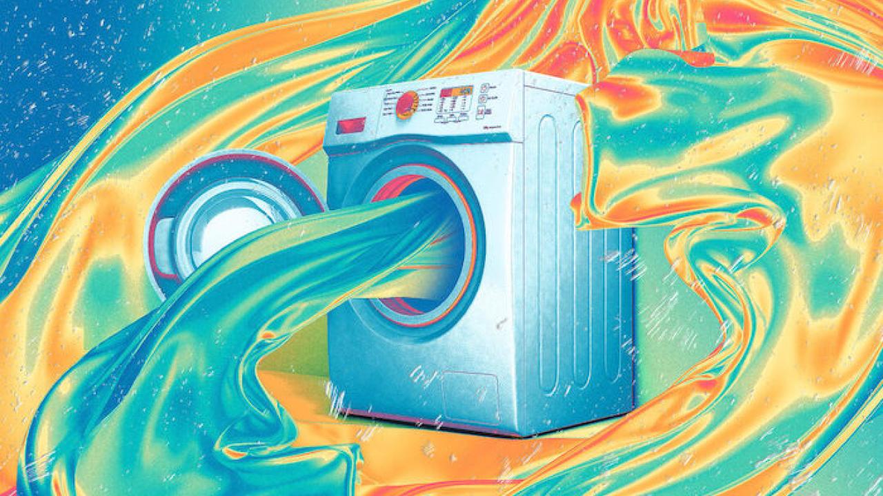 Illustration of a washing machine with water flowing out of it.