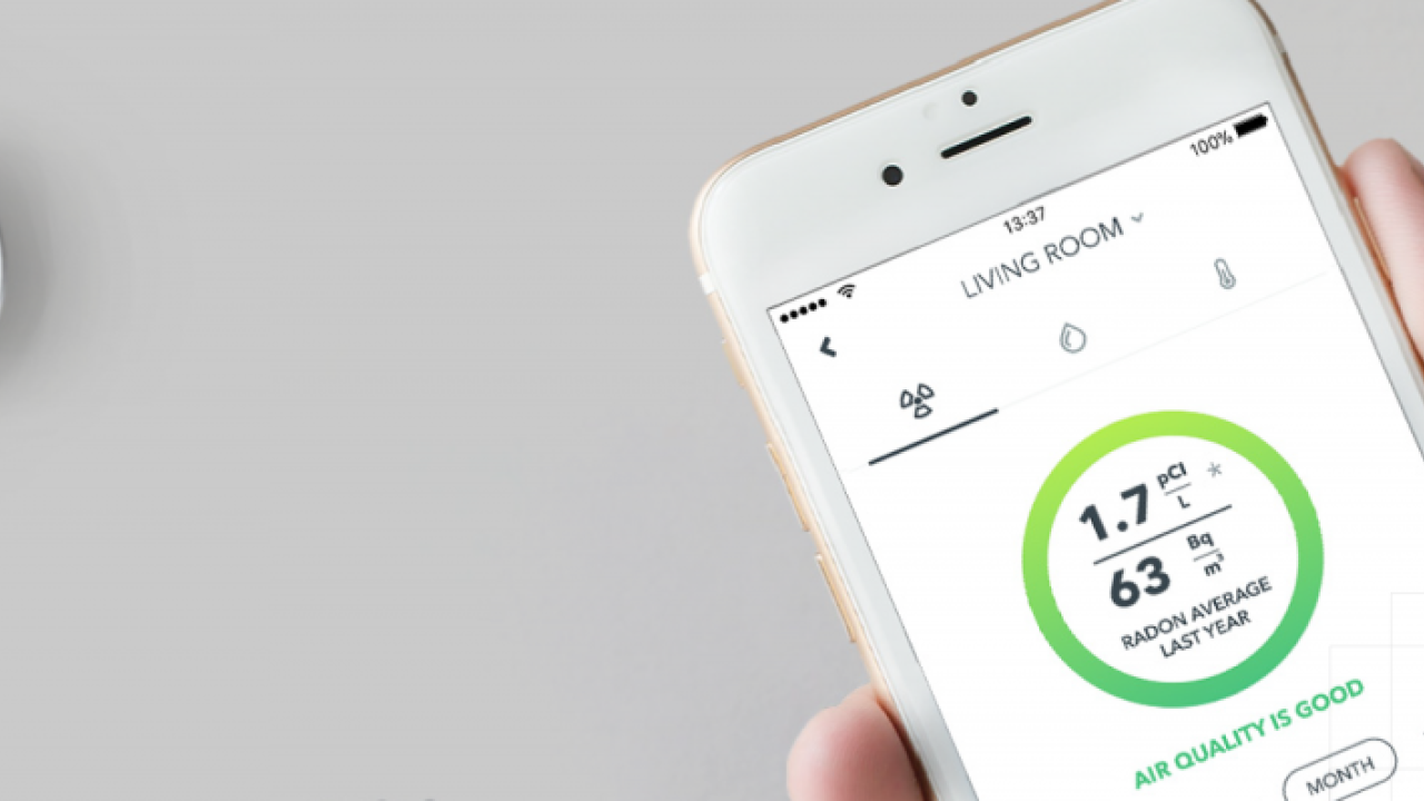 Airthings Radon detection unit and app on smartphone.