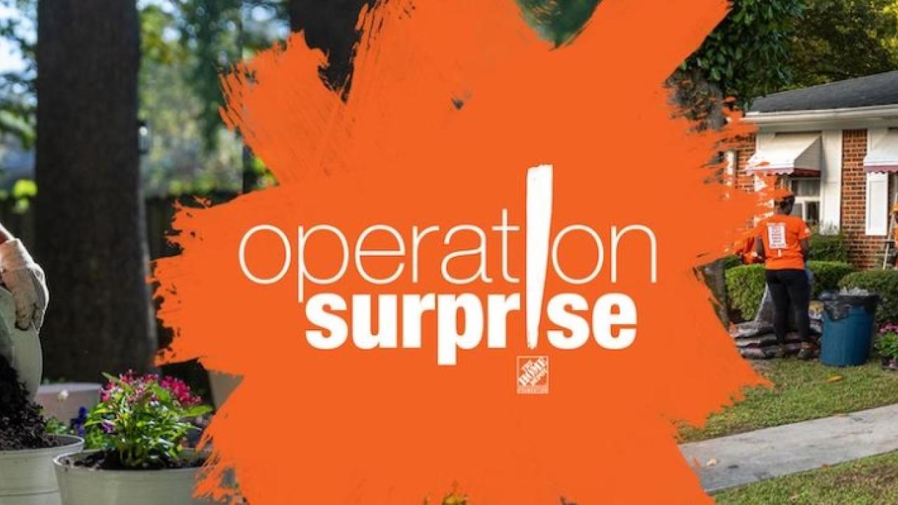 Operation Surprise! Home Depot volunteers are repairing a house. A woman is pouring cement from a bucket.
