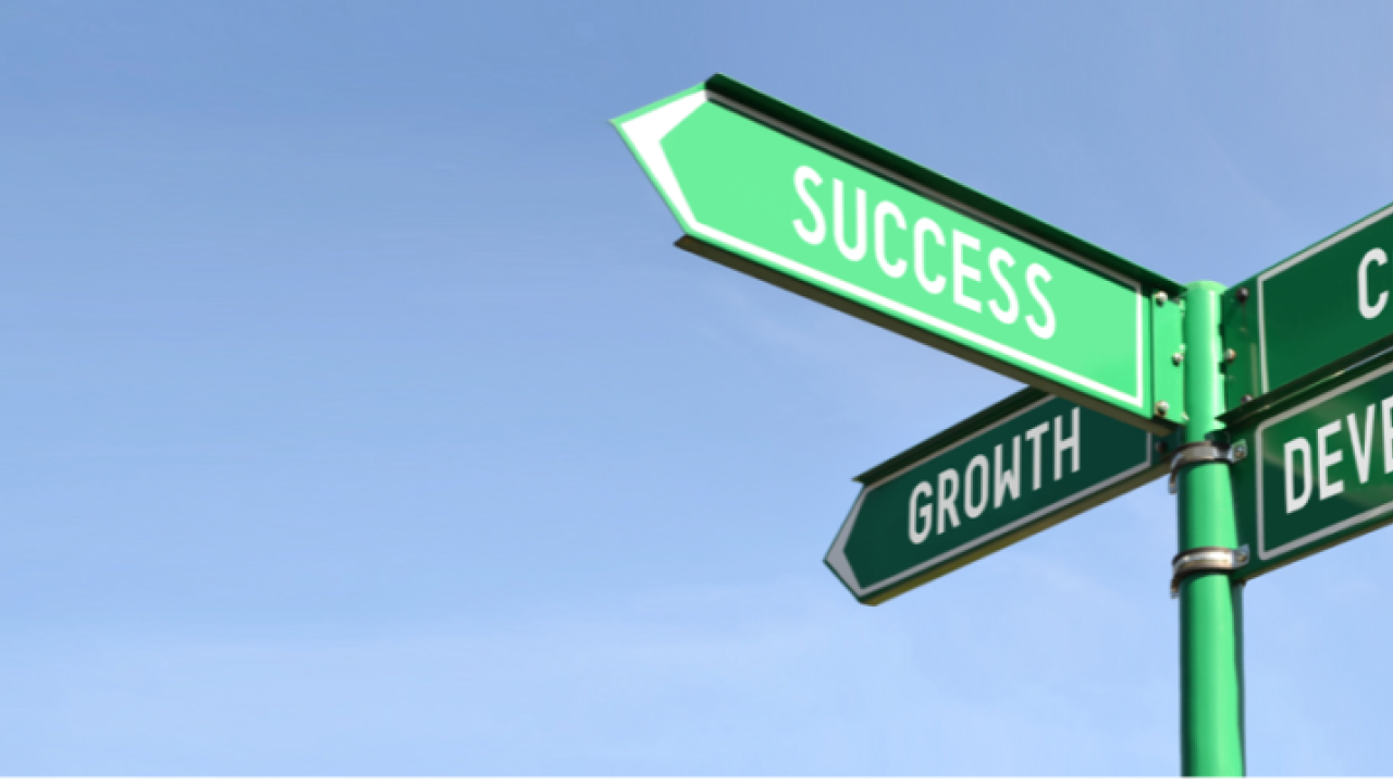 Sign post showing: Career, development, success & growth