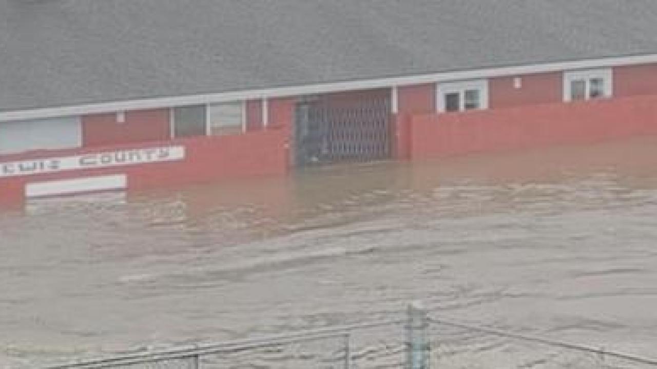 Lewis County Gospel Mission flooded in a historic January flood. Flood waters are up to window height.
