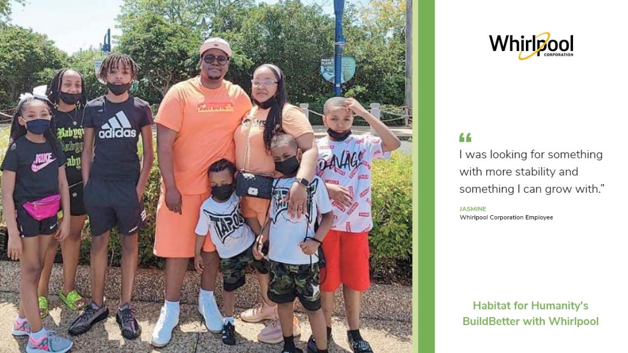 Jasmine and her family, wearing t-shirts, shorts, and face masks