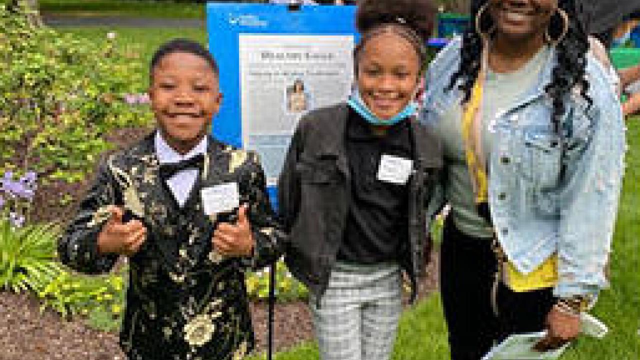 Two kids and one adult attending Healthy NewsWorks hosted their 2022 Film and Book Fest