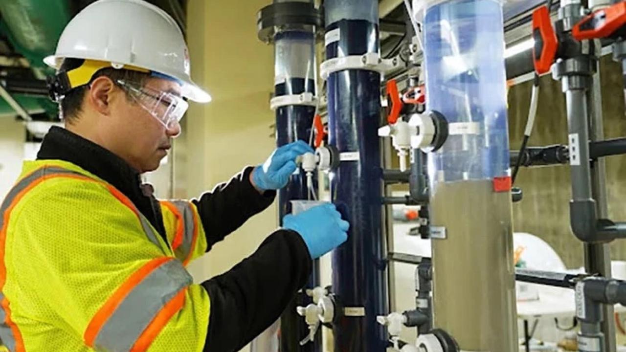 person working on machines