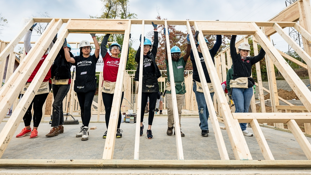 Whirlpool Corp. volunteers shown working on a Habitat for Humanity site.