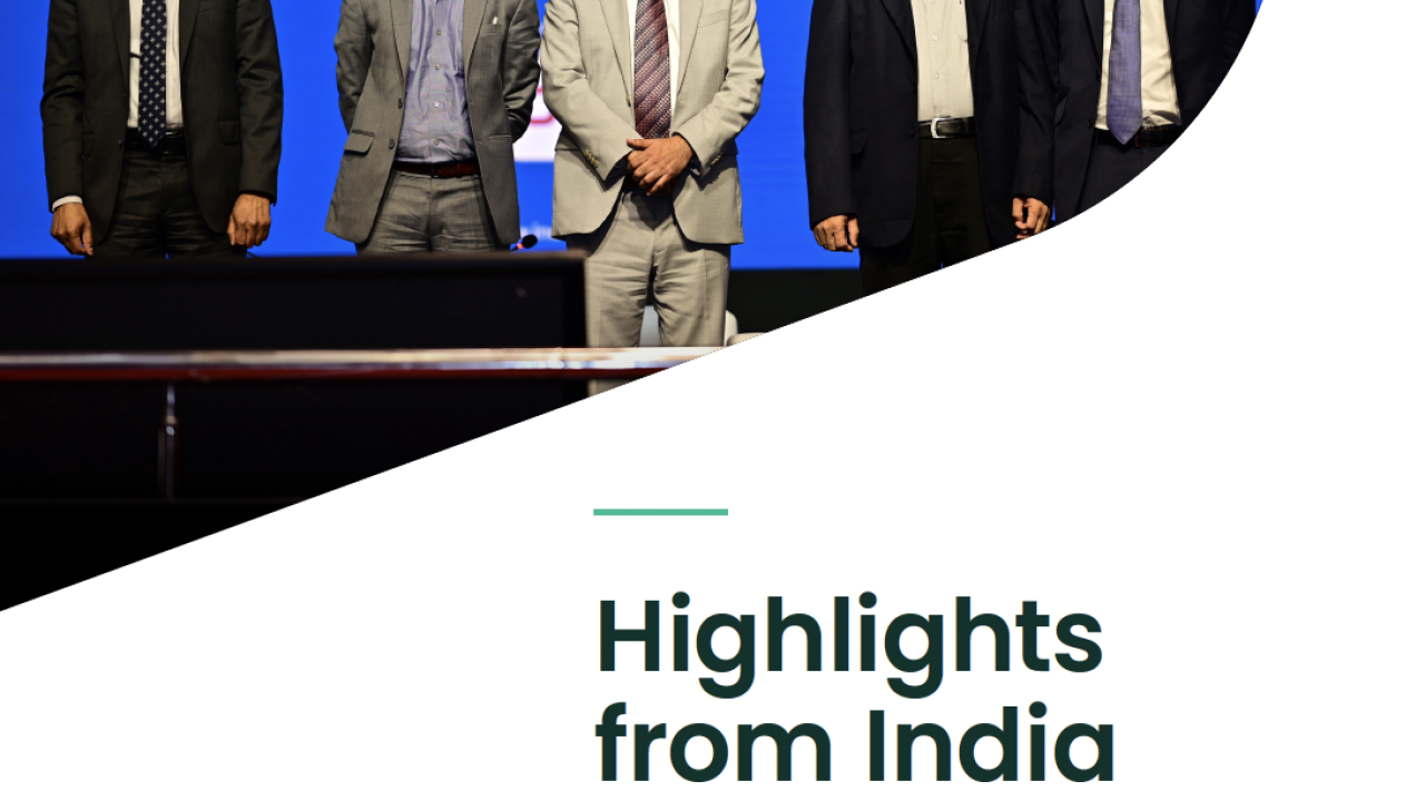 a group of people stood in a line on stage with the text "Highlights from India Energy Week"