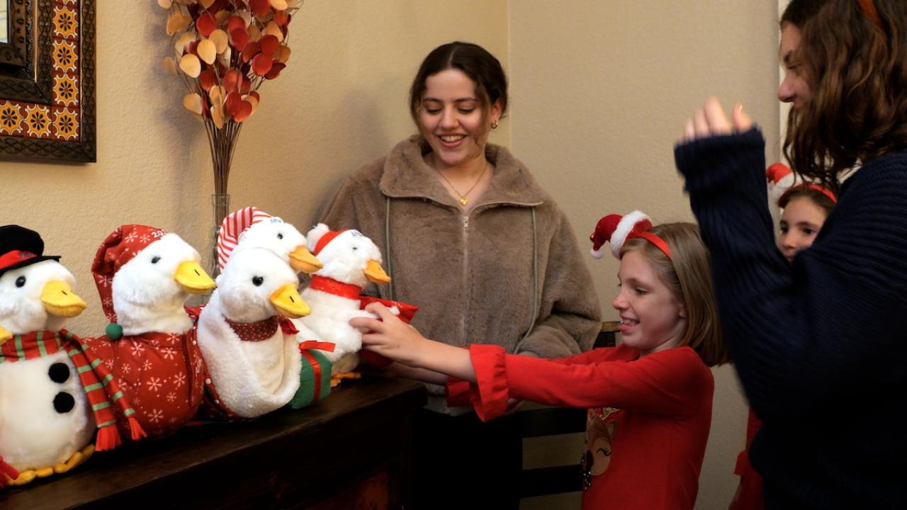 Family shown with the Aflac Duck. 