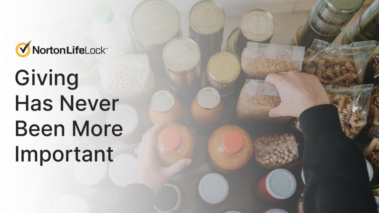 Hands organizing food donations with text overlaid that says Giving Has Never Been More Important