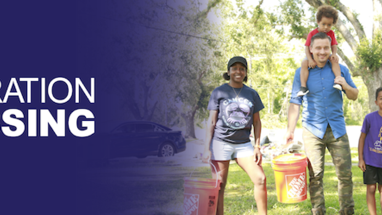 The Home Depot Operation Blessing. Family shown carrying orange buckets.