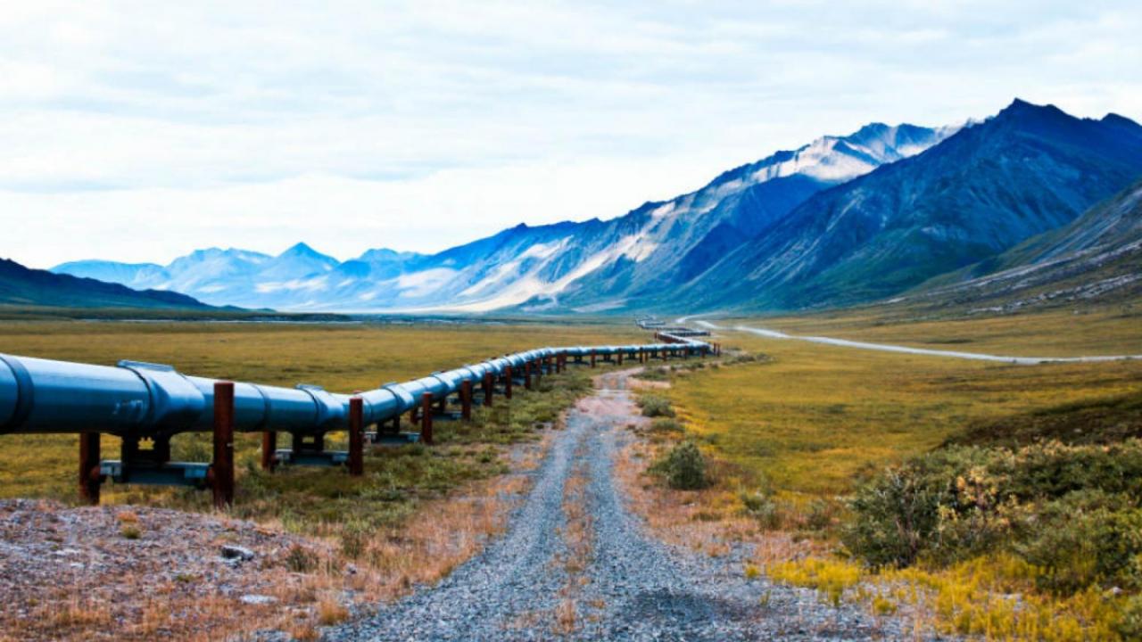 Landscape of pipeline running through mountain range