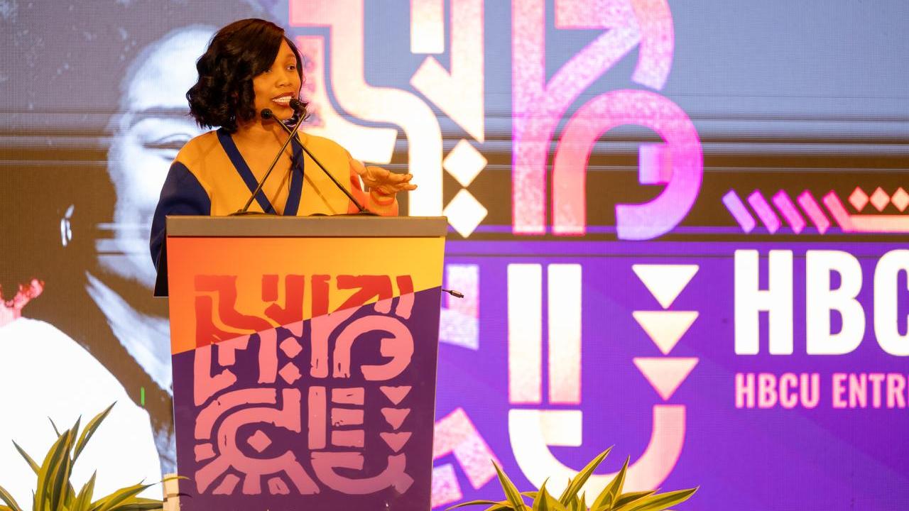 Woman speaking at podium