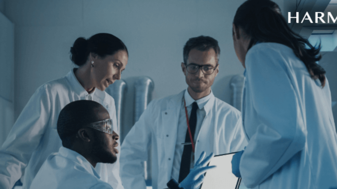 HARMAN Intelligent Health Care. Group of female and male doctors shown.
