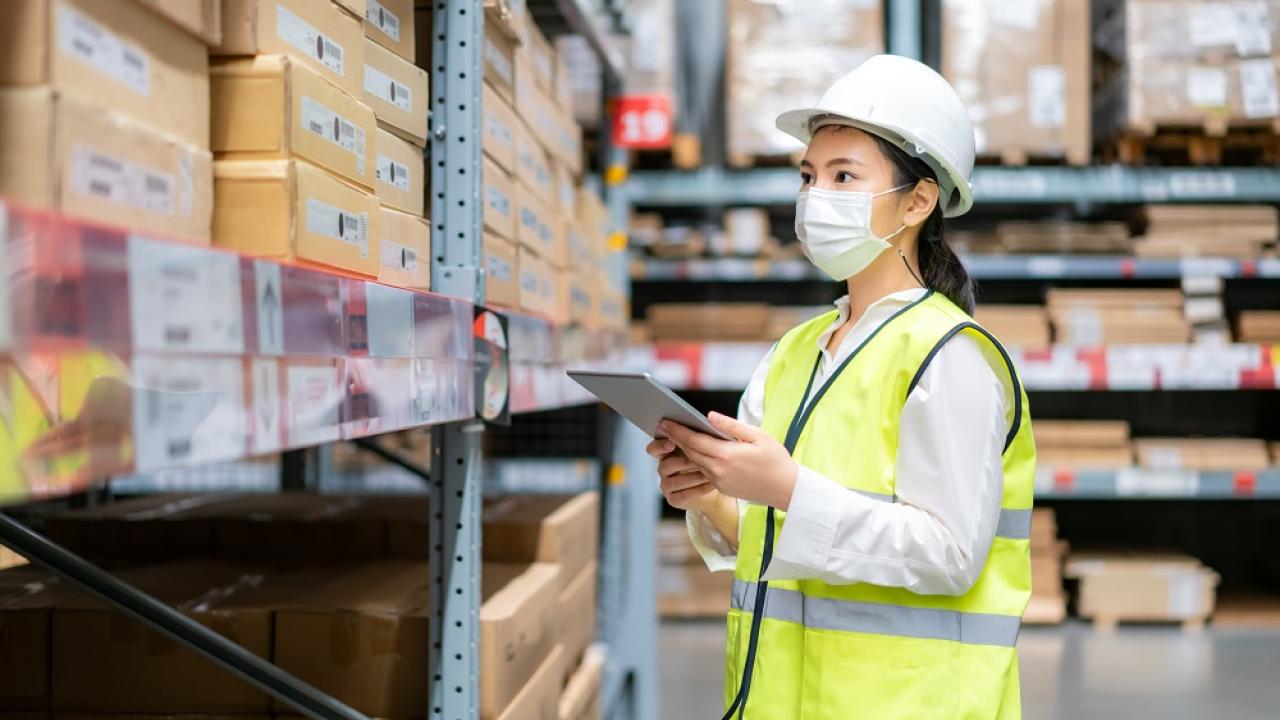 Employee inventories boxes