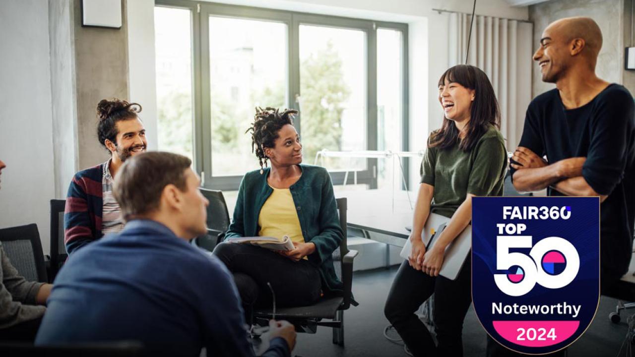 Group of colleagues having conversation 